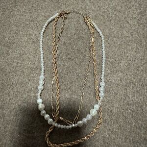 Elegant Gold and Silver Multi-Strand Necklace